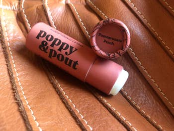 Lip balm tube labeled 