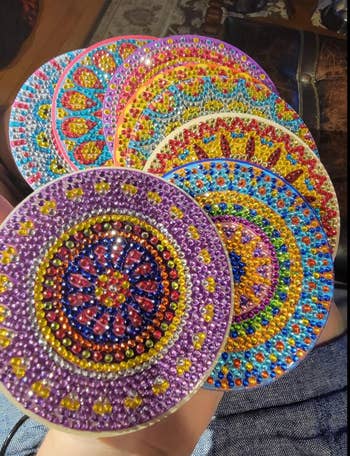 Diamond painted coasters with colorful mosaic design