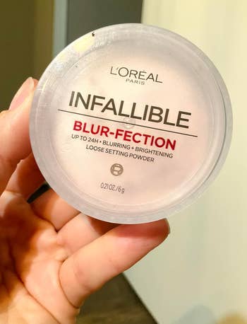 Close-up of L'Oreal Infallible Blur-Fection setting powder, advertised for 24-hour blurring and brightening effects