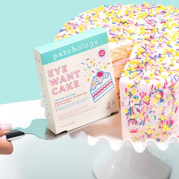 Eye mask box styled like a cake slice being served from a sprinkled cake, emphasizing a fun, skincare-themed shopping experience
