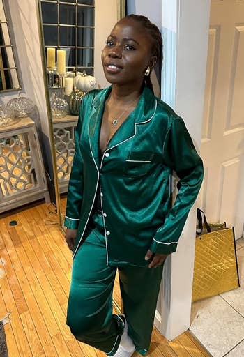 reviewer wearing the green pajama set