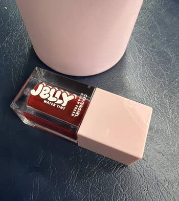 Lip tint in a rectangular container labeled