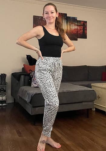 Reviewer wearing the leopard print pants