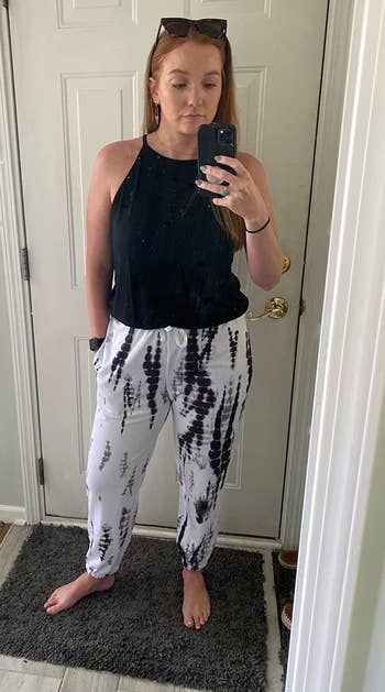 Reviewer wearing the black and white patterned pants