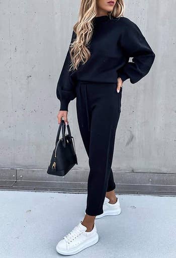 A model wearing the set in navy blue
