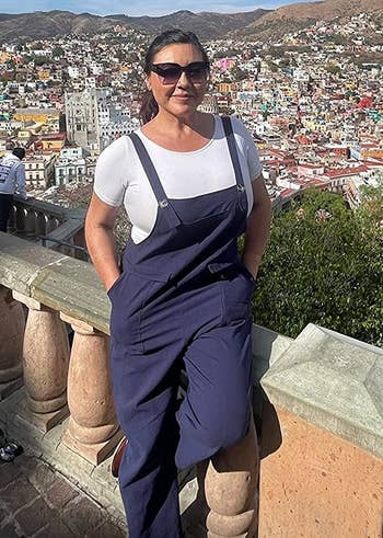 Reviewer wearing the navy overalls