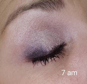reviewer in purple eyeshadow labeled