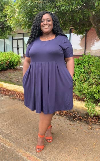 Reviewer wearing the purple dress