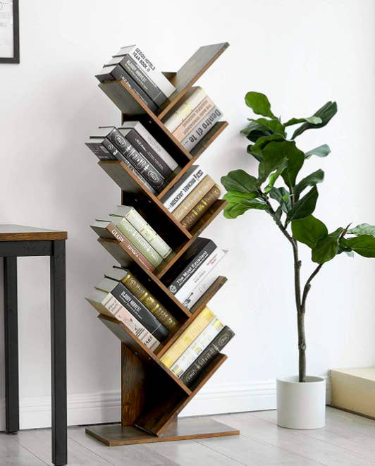 Vertical shelf with several pockets for books set on an angle