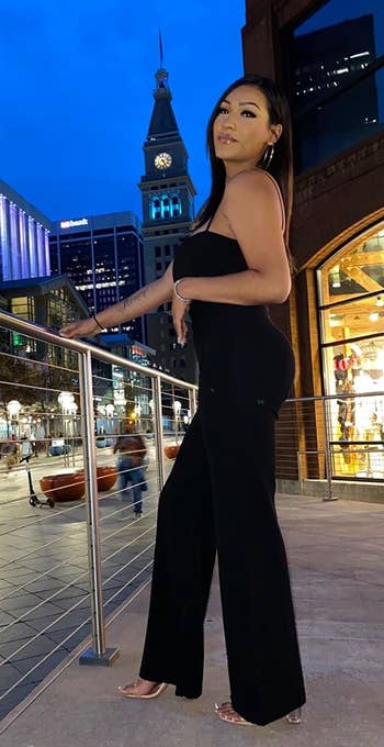 Reviewer wearing the black pants