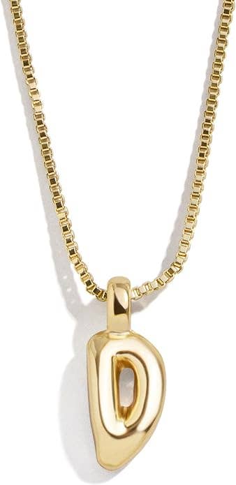 Gold chain necklace with a stylized