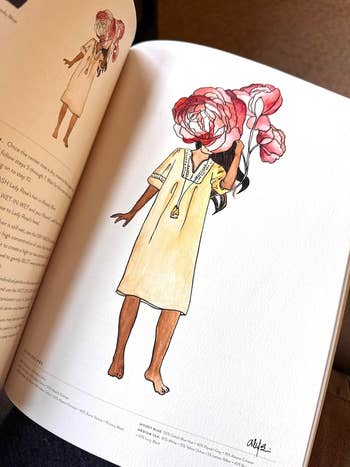 Illustration of a person in a simple dress with a large flower as a head, featured in an open book on design or art